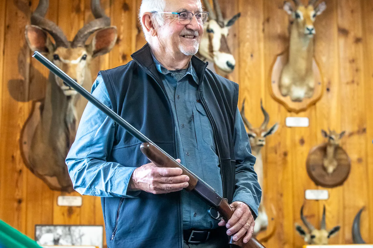 Keith Moser stands with a gun he was given by legendary outdoor writer Jack O’Connor when he was 15. (August Frank/Lewiston Tribune)