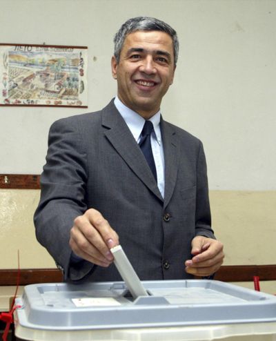 In this Oct. 23, 2004 file photo, Kosovo Serb politician Oliver Ivanovic casts his ballot during general elections in the northern, Serb-dominated part of Mitrovica, Kosovo. (Darko Vojinovic / Associated Press)