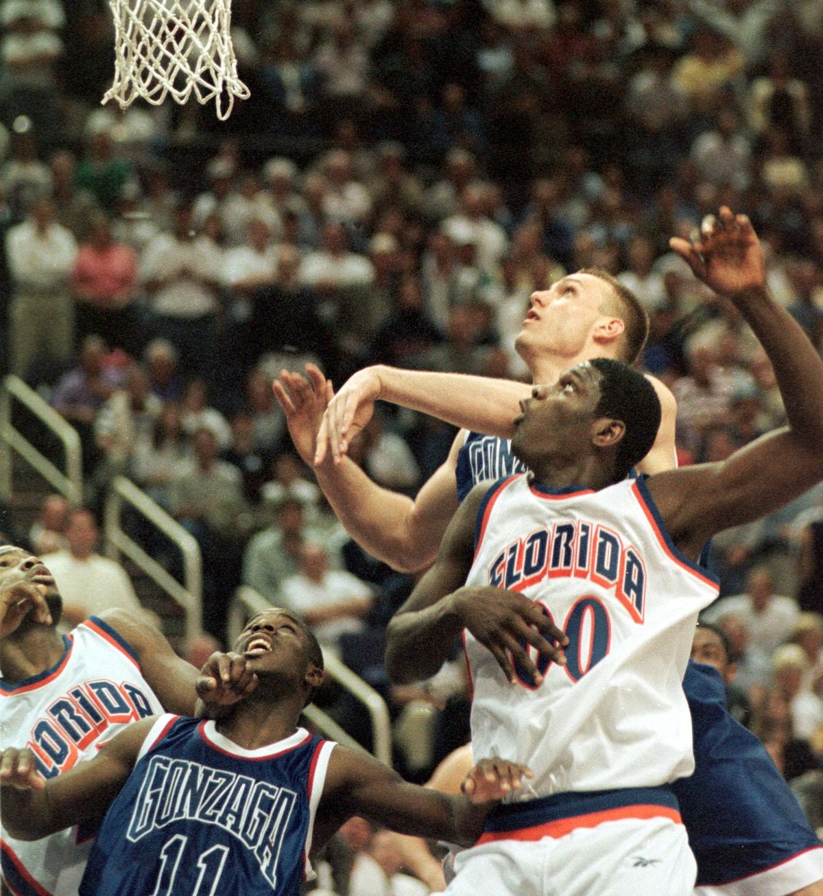 Casey Calvary tips in the winning shot in the final seconds over Florida’s Brent Wright, sending Gonzaga to the Elite Eight of the 1999 NCAA Tournament.  (Dan Pelle/The Spokesman-Review)