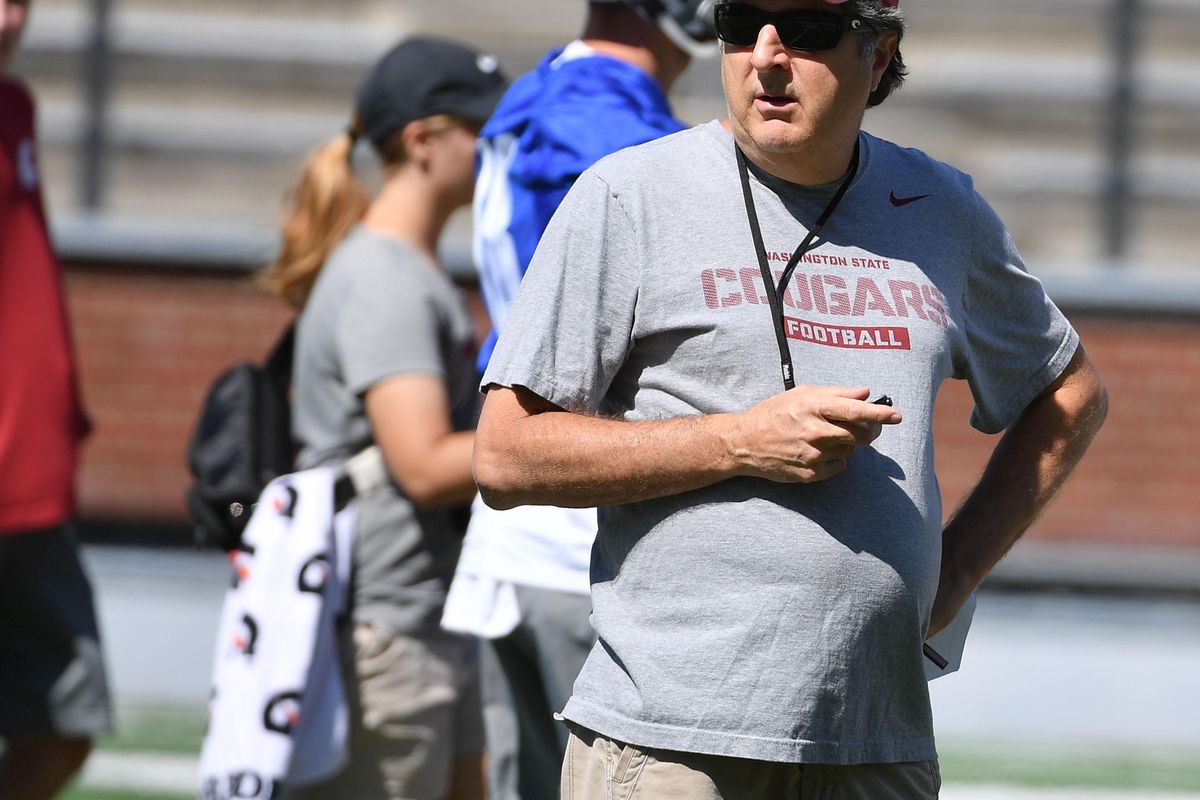 Washington State coach Mike Leach is tasked with replacing key players and staff members from last season’s team. (Tyler Tjomsland / The Spokesman-Review)