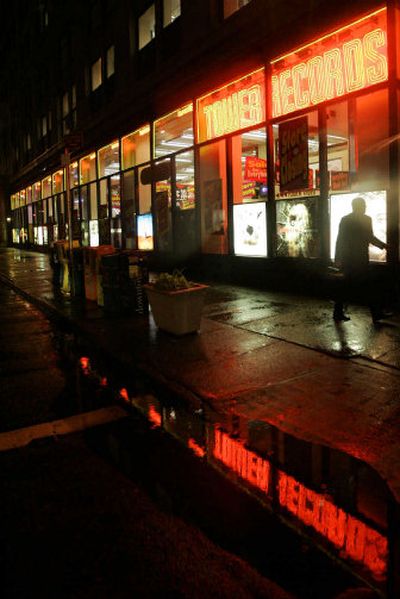 
A pedestrian walks past a Tower Records store in Manhattan. 
 (Associated Press / The Spokesman-Review)