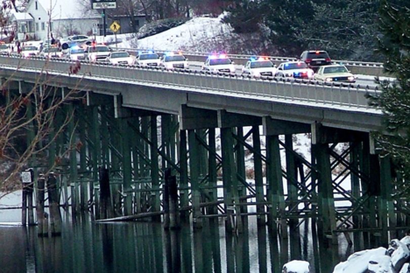 More than three dozen police and emergency vehicles formed a procession across the Spokane Street Bridge, led by the restored 1980 Malibu that the late Cliff Hayes used during his tenure as Post Falls Chief of Police. A celebration of life for Hayes drew more than 300 people to the Lions Grand Pavilion at Q'emiln Park on Saturday afternoon. (Kerri Pr)