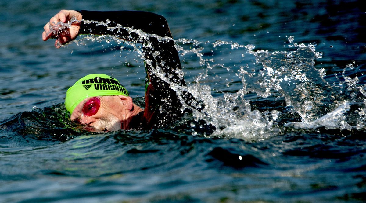 “This is either number 12, 13 or 14,” said Charlie Brockus, 65, of Reno, Nevada, about the number of Ironman triathlons he’s competed in. He was swimming the course at Lake Coeur d’Alene on Thursday, Aug. 18, 2016. The race consists of a 2.4-mile swim, a 112-mile bike ride and a 26.2-mile run and will take place in Coeur d’Alene on Sunday. (Kathy Plonka / The Spokesman-Review)