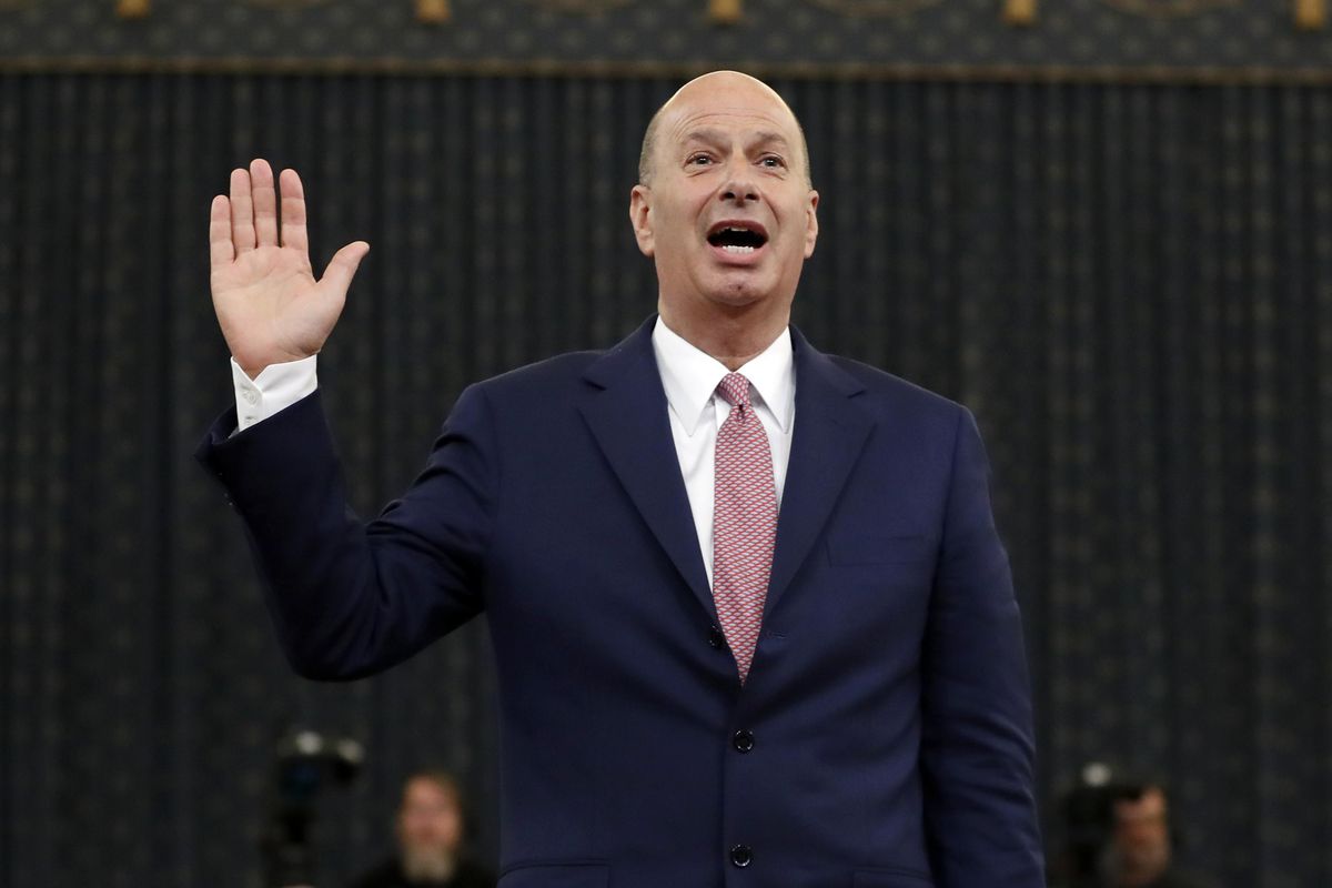 In this Nov. 20, 2019, file photo U.S. Ambassador to the European Union Gordon Sondland is sworn in to testify before the House Intelligence Committee on Capitol Hill in Washington, during a public impeachment hearing of President Donald Trump’s efforts to tie U.S. aid for Ukraine to investigations of his political opponents. President Donald Trump has ousted Sondland, who gave damaging testimony in impeachment inquiry. (Andrew Harnik / Associated Press)