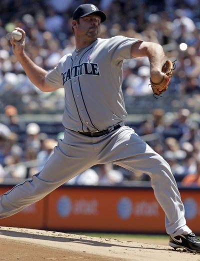 Seattle Mariners starting pitcher Kevin Millwood throws during the first inning of a baseball game against the New York Yankees at Yankee Stadium in New York, Sunday, May 13, 2012. (Seth Wenig / Associated Press)