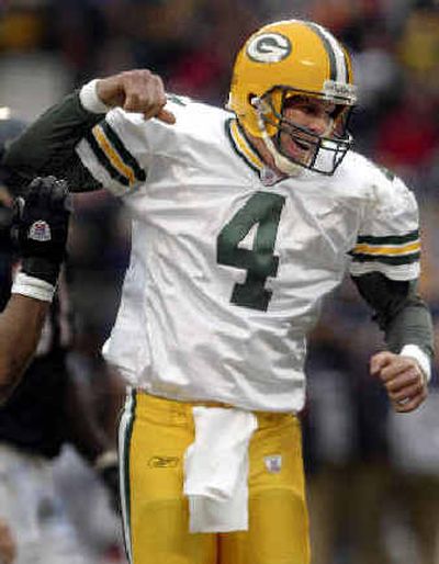 
Quarterback Brett Favre had the right touch while making Green Bay the NFC's No. 1 team in total offense. 
 (Associated Press / The Spokesman-Review)