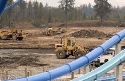 
Earthmovers works on the northside of the Velocity Peak waterslides at Boulder Beach, Silverwood Theme Park's water park. The park will double in size by next summer, adding another wave pool and a large raft slide. 
 (Jesse Tinsley / The Spokesman-Review)