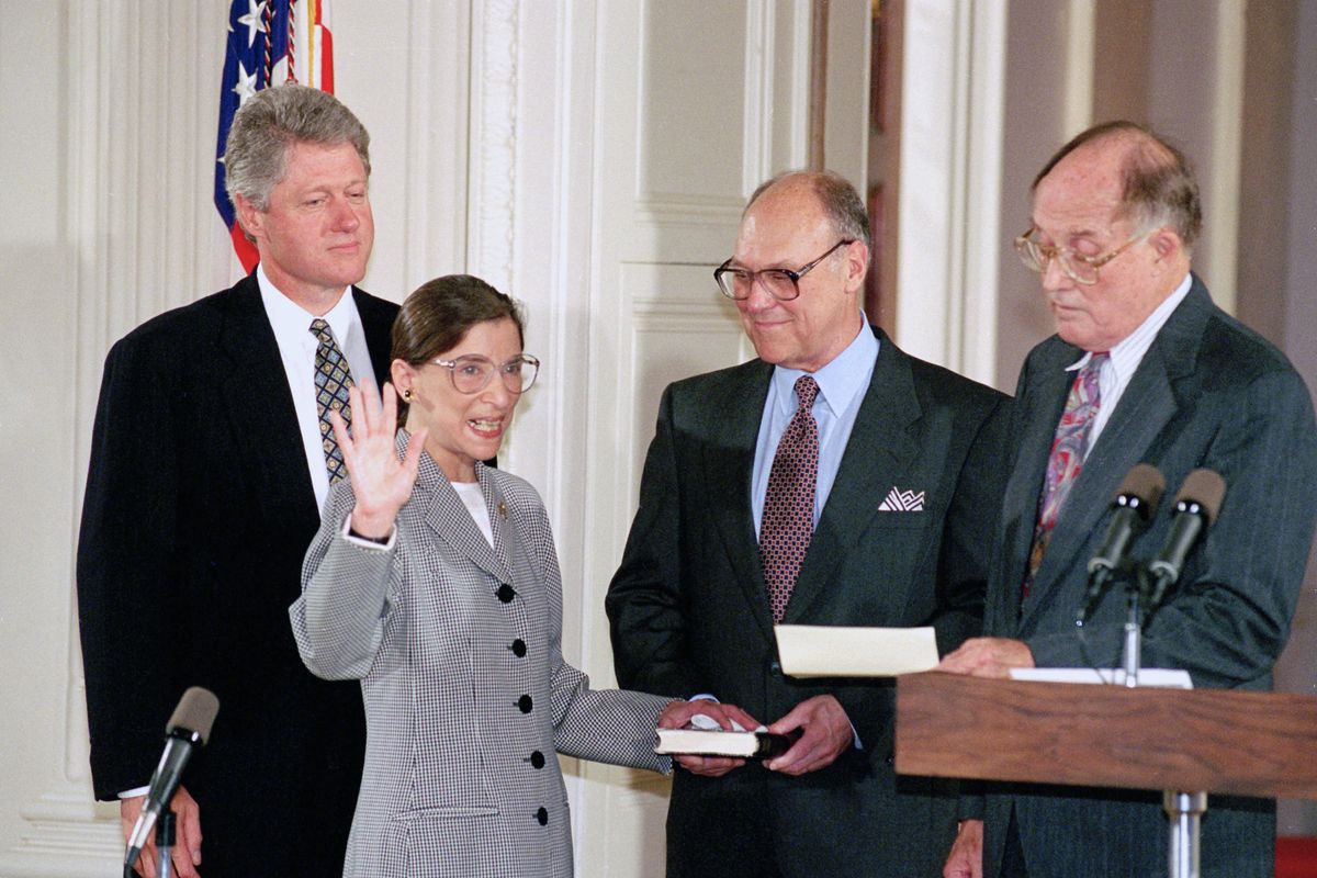 FILE - In this Aug. 10, 1993, file photo, Supreme Court Justice Ruth Bader Ginsburg takes the court oath from Chief Justice William Rehnquist, right, during a ceremony in the East Room of the White House in Washington. Ginsburg