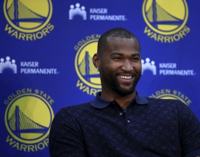 Golden State Warriors’ DeMarcus Cousins smiles during a media conference Thursday, July 19, 2018, in Oakland, Calif. Cousins signed a one-year, $5.3M deal with the defending champion Warriors. (Ben Margot / Associated Press)