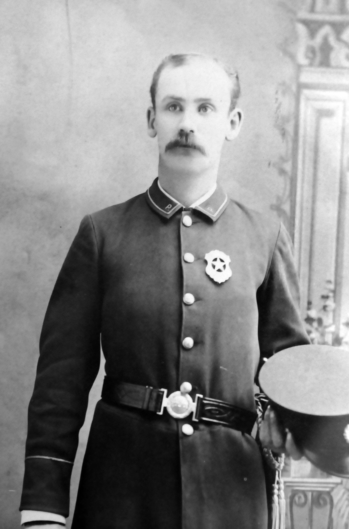 A photo of a young William H. Lewis is displayed at the Spokane Law Enforcement Museum. 