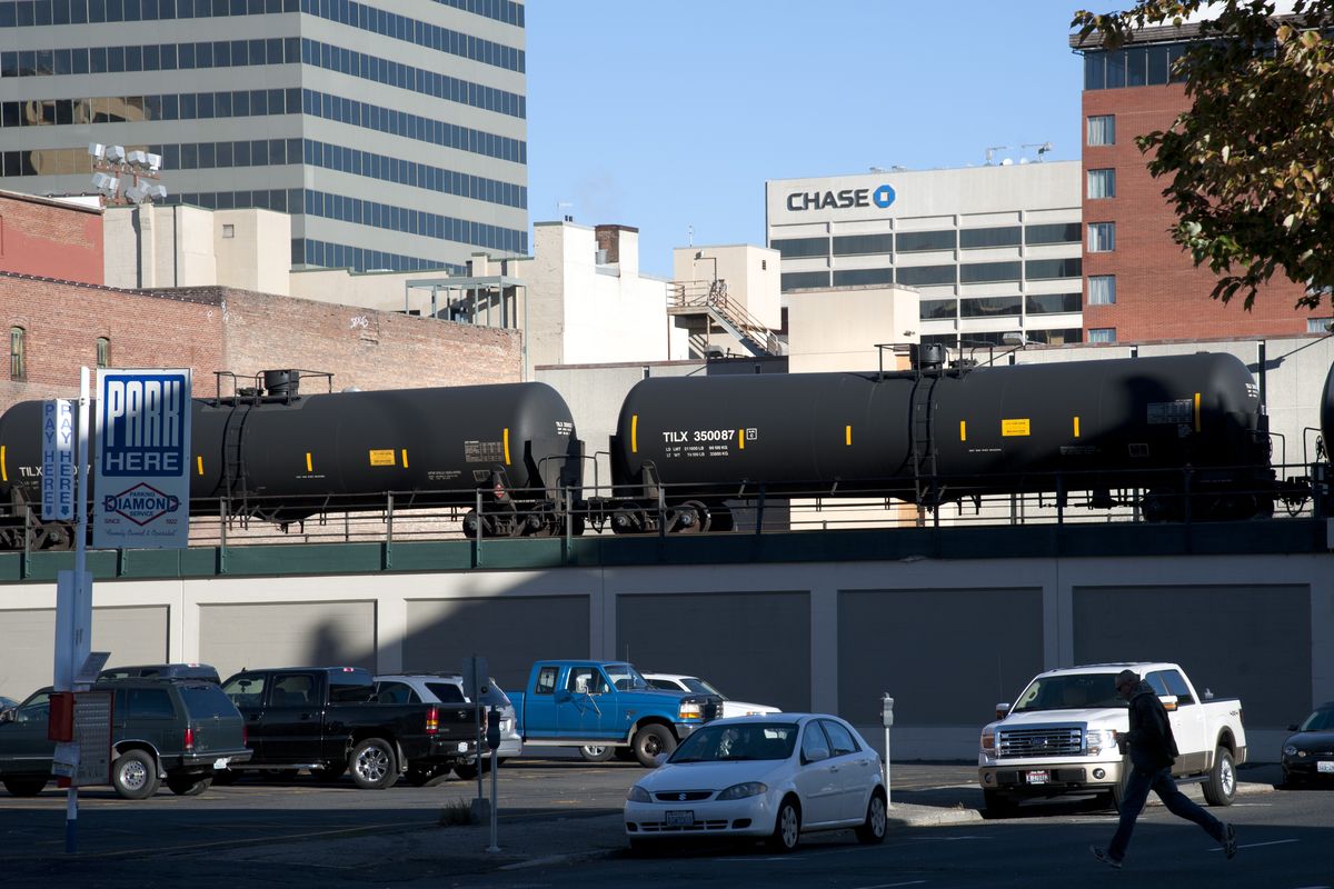A train carrying flammable liquids heads west through downtown Spokane on Oct. 1. (Dan Pelle)