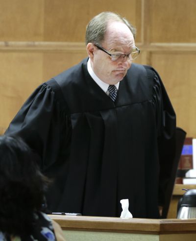 Judge Larry Hendricks adjourns court after he blocked the first- in-the-nation ban on an abortion procedure in Topeka, Kan. (Associated Press)