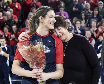 Gonzaga senior Emma Wolfram is embraced by her mother, Jane, before the BYU game, Saturday, Feb. 24, 2018, in the McCarthey Athletic Center. (Dan Pelle / The Spokesman-Review)