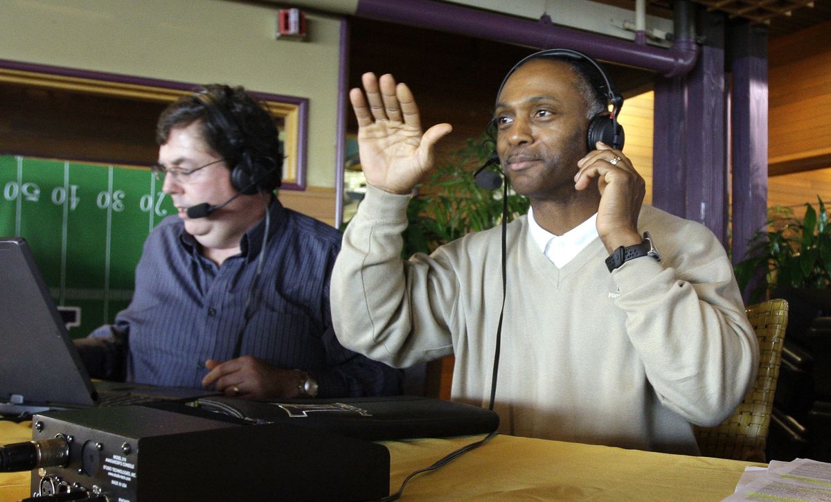 Tyrone Willingham waves to supporters prior to his weekly radio program Monday with Mike Gastineau. Willingham seemed surprised that he could have skipped the show. “You mean, I could have turned it down?” Willingham said. (Associated Press / The Spokesman-Review)