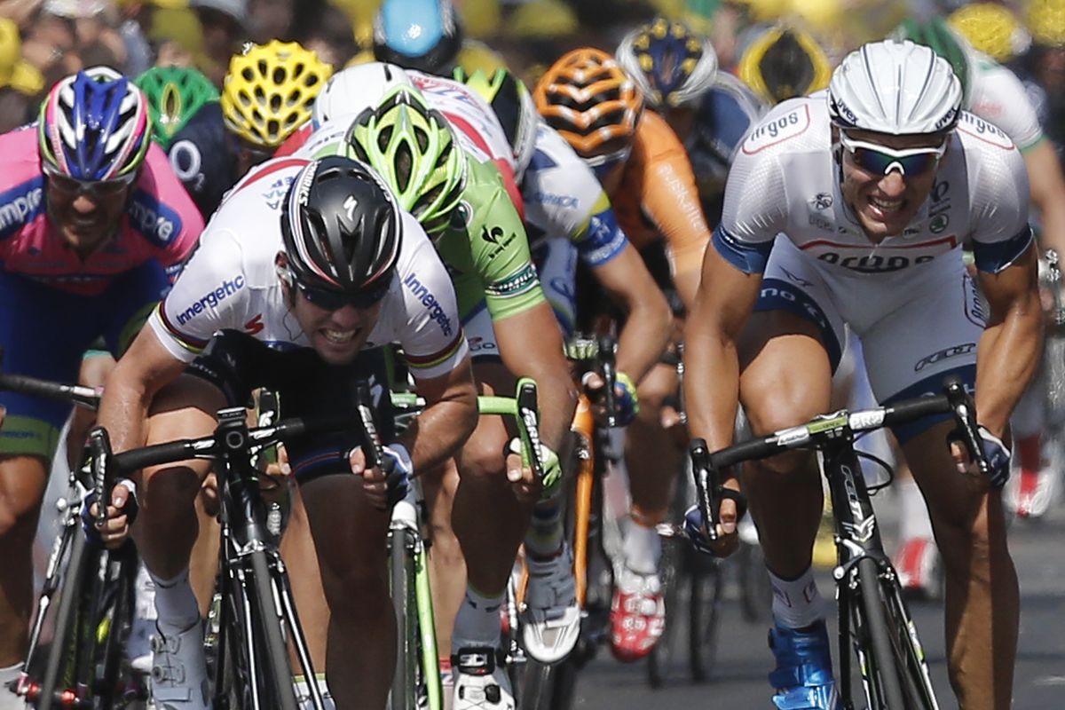 Britain’s Mark Cavendish, left, is finding it more difficult to pile up stage victories against the likes of Marcel Kittel, right. (Associated Press)