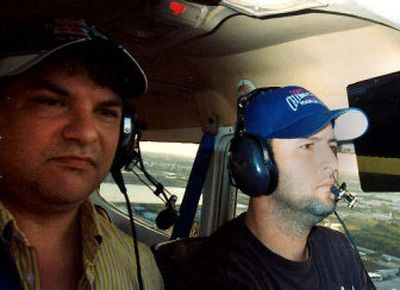 
Cory Lidle, right, piloted Bucks County (Pa.) Courier Times reporter Randy Miller last February. 
 (Associated Press / The Spokesman-Review)