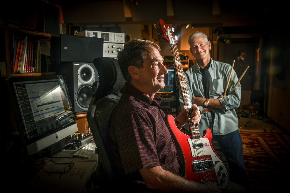 Former Gonzaga classmates and bandmates Jim “Fritz” Braukmann, Pete Arthur and Mike O’Neill (not pictured) had a popular local band the Juggernauts in the 1960s. O’Neill went on to a career in music and lives in Germany. During the pandemic, they reconnected with O’Neill and decided to release a new CD of old hits in January. Arthur and Braukmann recorded here and O’Neill from Germany.  (Dan Pelle/The Spokesman-Review)