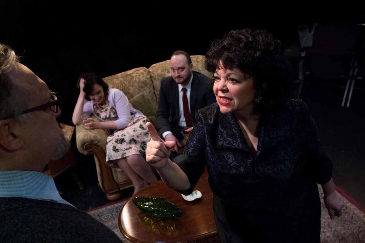 Mary Starkey, right, playing Martha, and Jamie Flanery, left, playing George; act out a scene with Emily Jones, background left, playing Honey, and Danny Anderson, background right, playing Nick during a rehearsal of Who