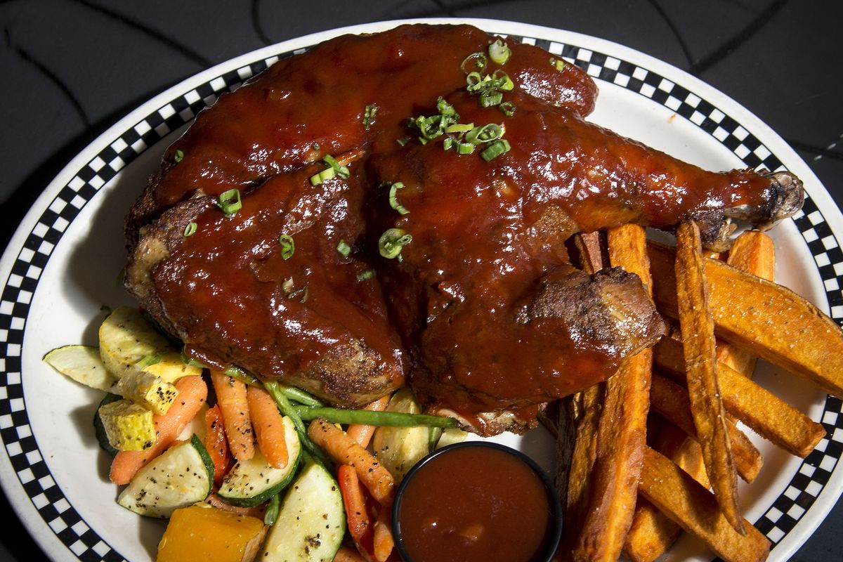 Stacks at Steam Plant serves Smoked BBQ Chicken, an “ale-brined” free-range half chicken, smoked in-house with mesquite wood and topped with its award-winning Huckleberry Harvest Ale barbecue sauce.