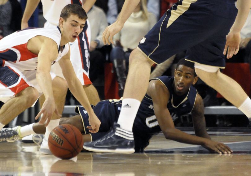 Notre Dame's Eric Atkins watches Gonzaga's David Stockton steal the ball from him, in the first half of an NCAA college basketball game, Wednesday, Nov. 30, 2011, in Spokane, Wash. (Jed Conklin / Fr170252 Ap)