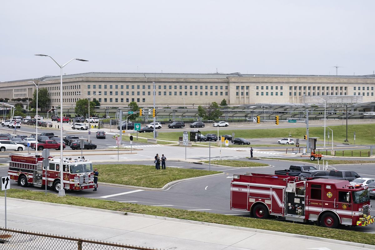 Emergency vehicles are seen outside the Pentagon Metro area Tuesday, Aug. 3, 2021, at the Pentagon in Washington. The Pentagon is on lockdown after multiple gunshots were fired near a platform by the facility