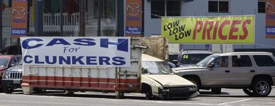 A “Cash for Clunkers” sign is displayed in front of a car dealership in Portland for the federal government’s Car Allowance Rebate System. (Rick Bowmer / The Spokesman-Review)