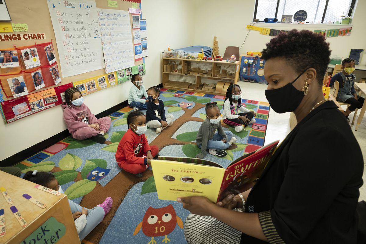 Melissa Jean reads “The Gruffalo” to her son’s pre-K class March 24 at Phyl’s Academy in the Brooklyn borough of New York. New York City schools will be all in person this fall with no remote options, Mayor Bill de Blasio announced Monday.  (Mark Lennihan)