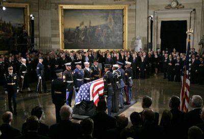 
The casket of former President Gerald R. Ford is placed in the Capitol Rotunda in Washington, D.C., on Saturday. 
 (Associated Press photos / The Spokesman-Review)