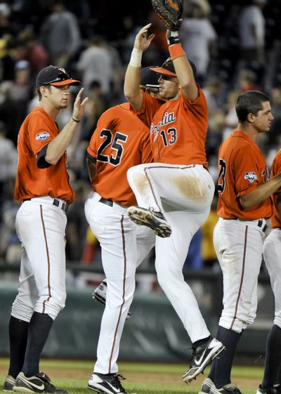 Virginia players celebrate their College World Series win over Cal. (Associated Press)