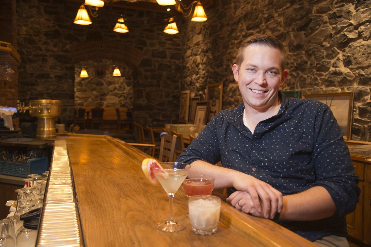 Chef and restaurateur Adam Hegsted sits at the bar of Gilded Unicorn in downtown Spokane in this 2015 file photo. (Jesse Tinsley / The Spokesman-Review)
