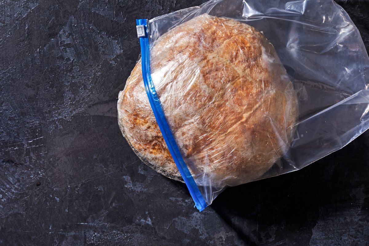 The easiest way to defrost a frozen loaf of bread is to place it, still wrapped, on the counter for a few hours or overnight and then crisp it in a 350- to 400-degree oven for a few minutes.  (Stacy Zarin Goldberg/For the Washington Post)