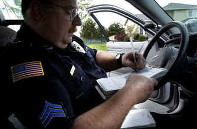 police officers giving a ticket