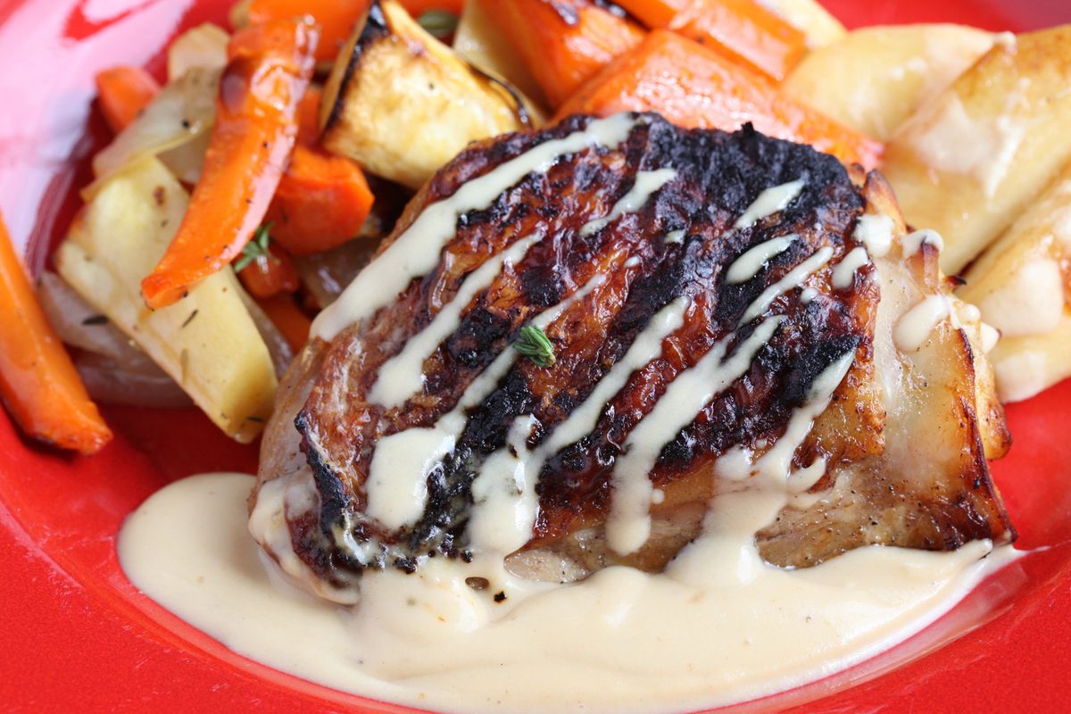 Apple cider can be used in recipes sweet and savory, including this dish of chicken thighs with apple cider cream sauce.