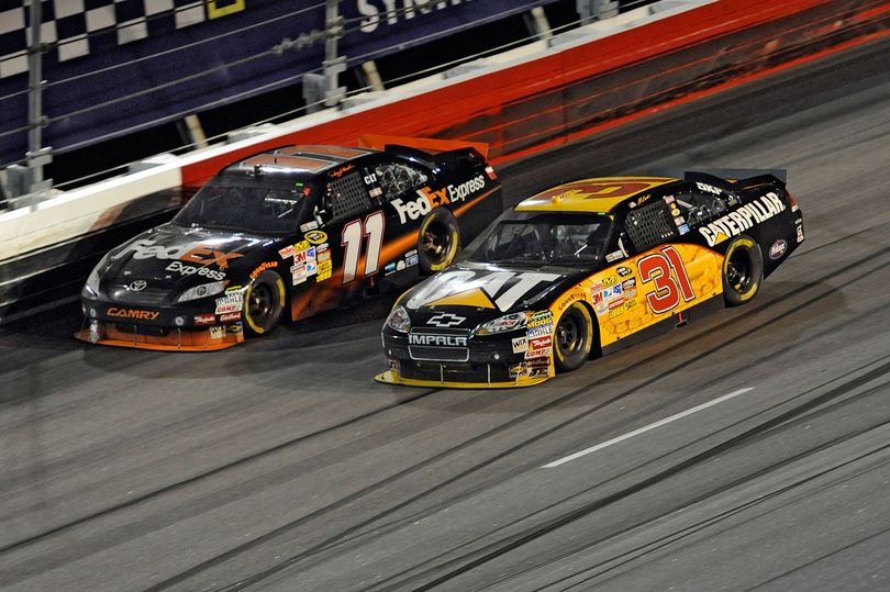 Denny Hamlin and Jeff Burton battle for the lead in the closing laps of the SHOWTIME Southern 500 at Darlington Raceway. (Courtesy of  John Harrelson/Getty Images for NASCAR) (John Harrelson / Getty Images North America)
