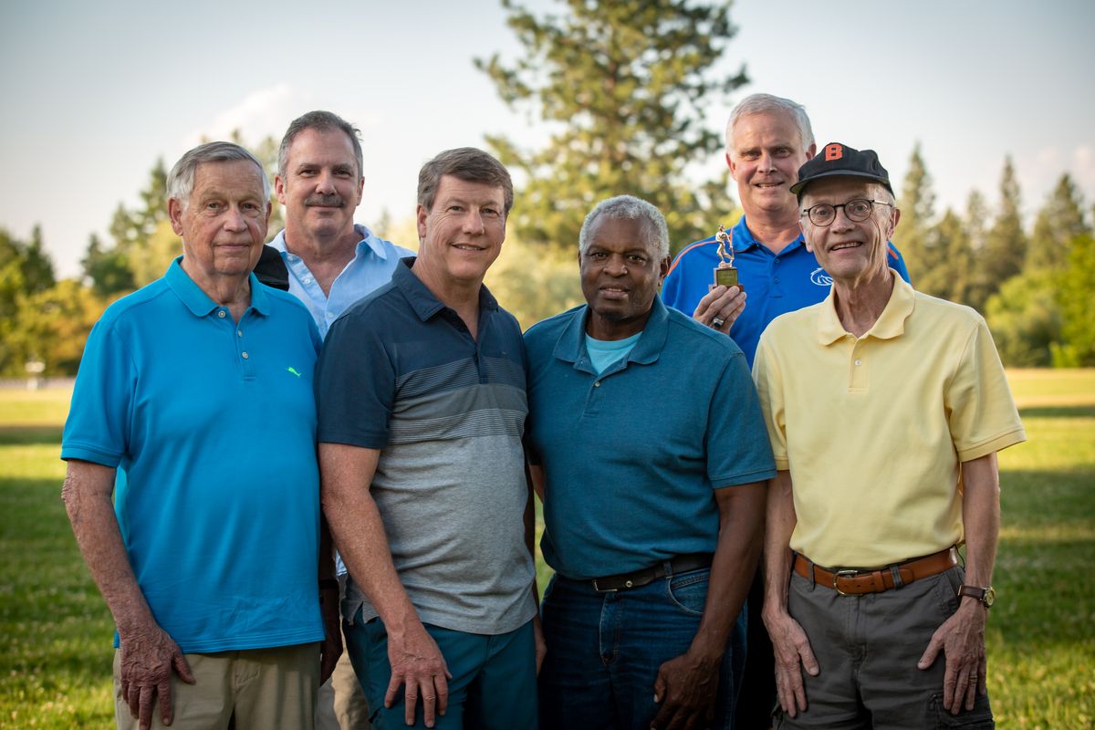 Members of the 1971 Mustang League city champions, Blythe Bullets, reunite for a portrait at their former practice field, The Reservoir, near 11th Avenue and Southeast Boulevard, on July 7, 2021. Pictured, from left, in the back row are sponsor Don Hart, representing Blythe and Co., and coach Wayne Walther; front row, players John Witter, Craig Hart, Darryl Stephens and Matt Manning. The Bullets were a team of 8- to 10-year-olds from the nearby Sacred Heart School, and this year marks the 50th anniversary of the championship win.  (Libby Kamrowski/ THE SPOKESMAN-REVIEW)