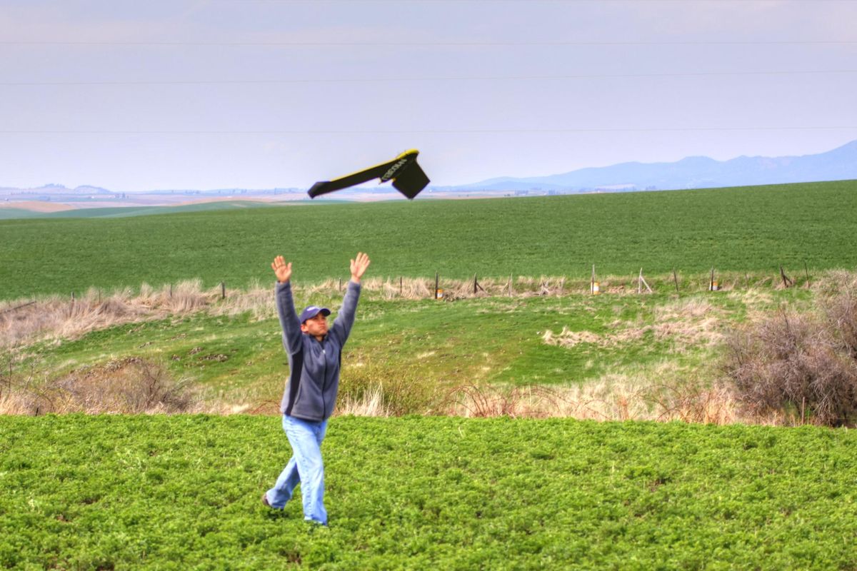 Empire Unmanned pilot Joe Swart launches a drone at Three Canyon Farms in Kendrick, Idaho, in April 2015. (Courtesy of Empire Unmanned)