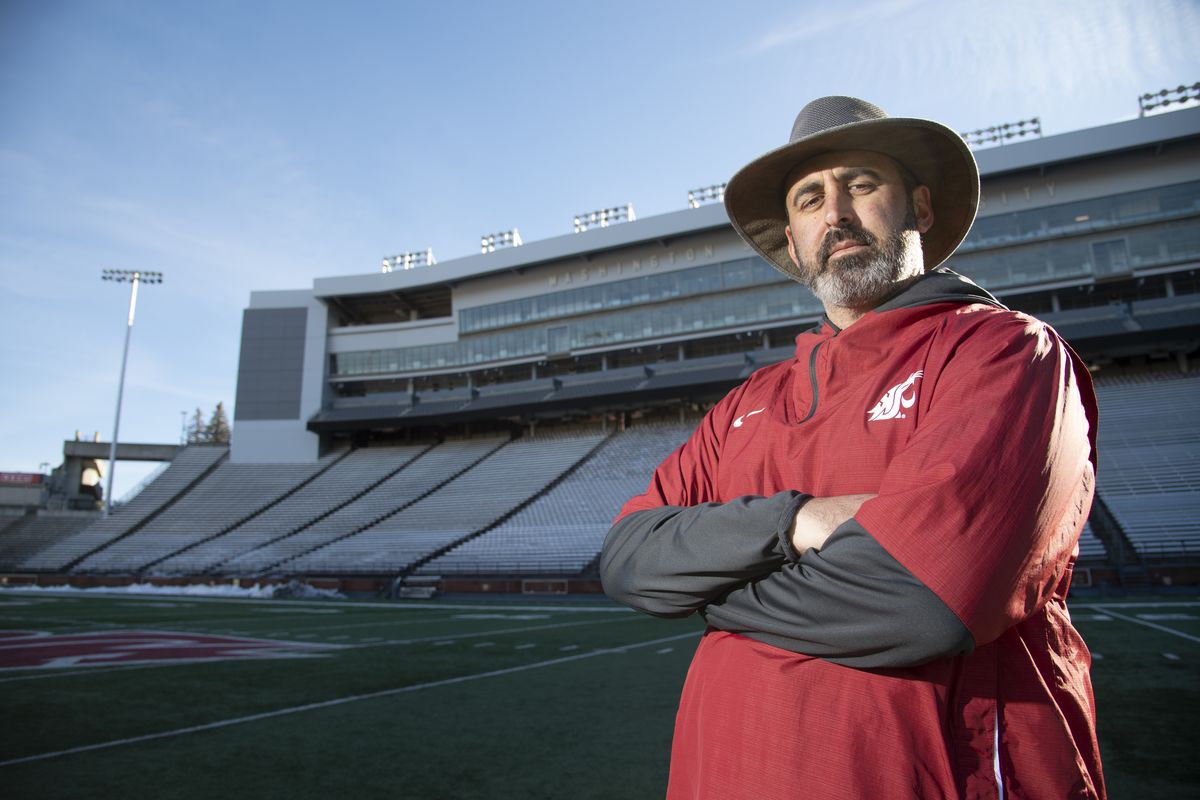 WSU Cougars Coach Nick Rolovich stands on the field in Martin Stadium Saturday, Oct. 31, 2020. The first-year coach will lead the Cougs in their first game of 2020 at Oregon State Saturday.  (Jesse Tinsley/THE SPOKESMAN-REVI)