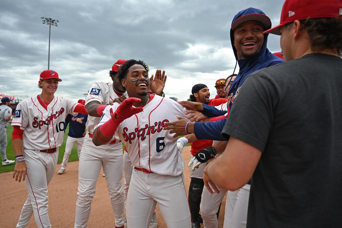 Spokane Indians infielder Roynier Hernandez celebrates with teammates after hitting a walk-off single in the 10th inning against the Tri-City Dust Devils on June 28, 2026 at Avista Stadium.   (James Snook)