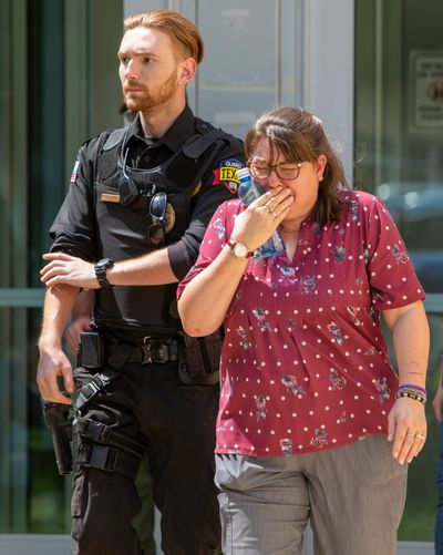 A woman cries May 24 as she leaves the Uvalde Civic Center following a shooting earlier in the day at Robb Elementary School in Uvalde, Texas.  (William Luther /The San Antonio Express-News via Associated Press)