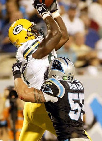 
Green Bay's David Martin, left, catches a touchdown pass over Dan Morgan. 
 (Associated Press / The Spokesman-Review)