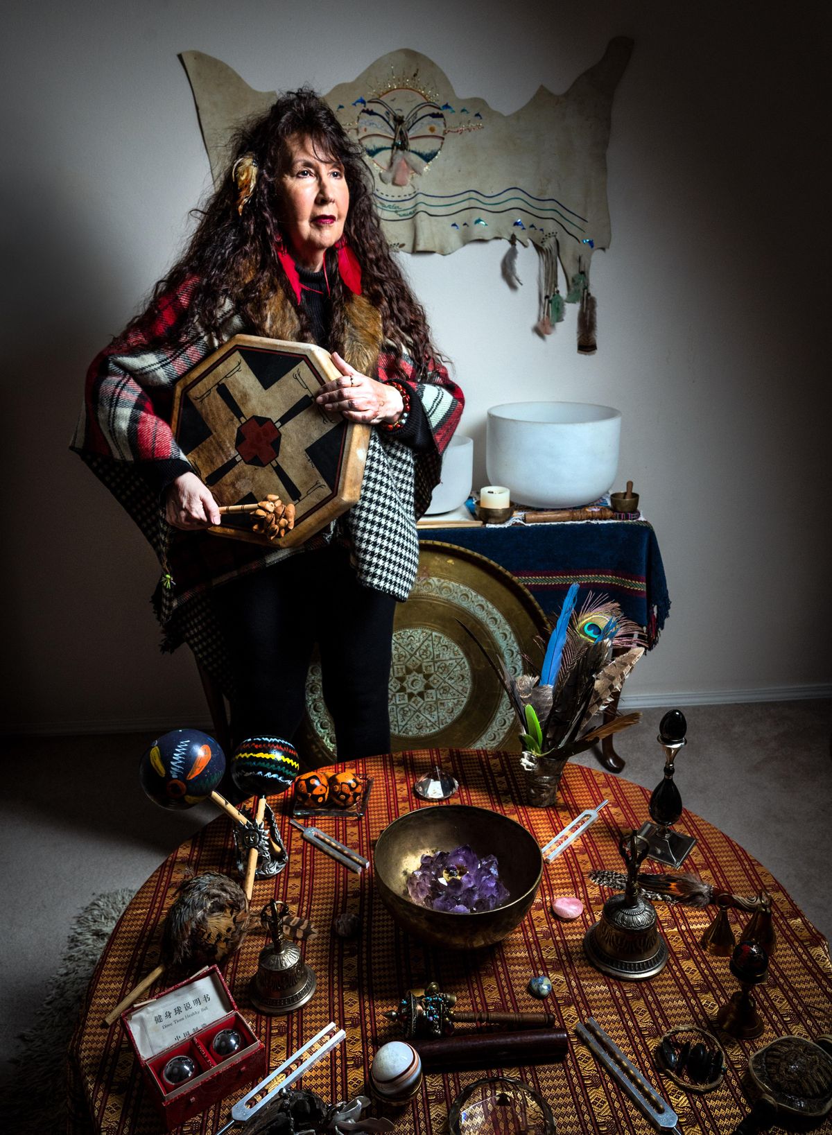 Jea’nah Jens is a mystic shaman and tarot card reader who incorporates sound therapy in her sessions with crystal bowls, drums, rattles, bells, tuning forks and other instruments. Jens said sound vibrates to the cellular level and helps detoxify a person. (Colin Mulvany / The Spokesman-Review)
