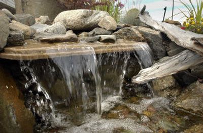 
Now you can enjoy the beauty of a waterfall, such as this one at All About Ponds, without the pond. 
 (Dan Pelle / The Spokesman-Review)