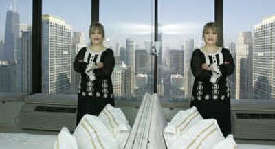 British agent Mia Wilkinson shows a two-bedroom apartment with a view of the Chicago skyline and Lake Michigan on Wednesday.Associated Press
(Associated Press / The Spokesman-Review)
