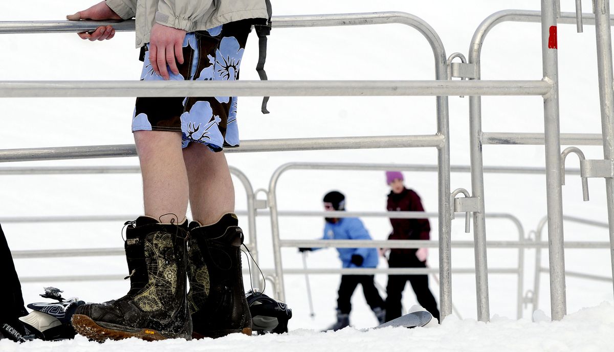 kathypl@spokesman.com “I’ve always wanted to do this,” Cody Mills, of Sagle, Idaho, said about wearing board shorts while skiing at Schweitzer Mountain Resort last Thursday. (Kathy Plonka)