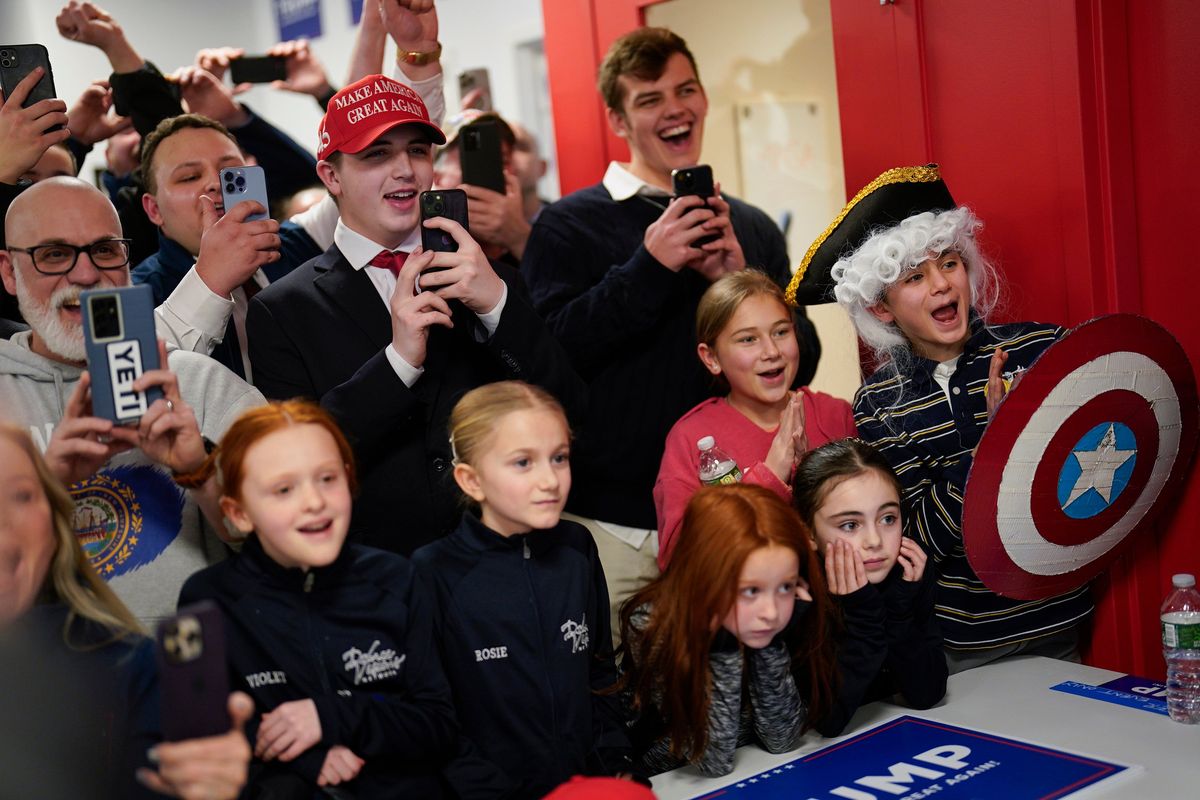 Supporters react as Trump makes a campaign stop in Manchester on Sunday. (Jabin Botsford/The Washington Post)