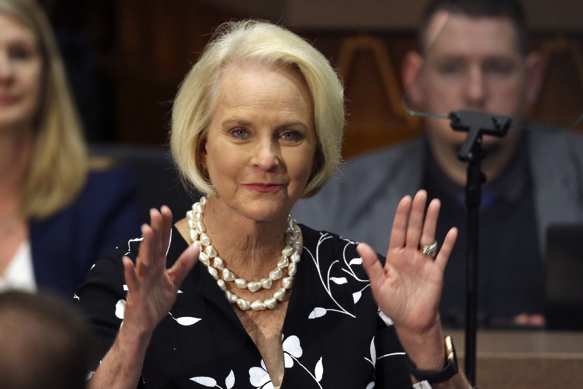 In this Jan. 13, 2020 photo, Cindy McCain, wife of former Arizona Sen. John McCain, waves to the crowd after being acknowledged by Arizona Republican Gov. Doug Ducey during his State of the State address on the opening day of the legislative session at the Capitol in Phoenix. Arizona Republicans voted Saturday, Jan. 23, 2021 to censure Cindy McCain and two prominent GOP officials who have found themselves crosswise with former President Donald Trump.  (Ross D. Franklin)