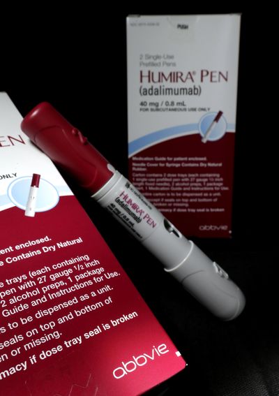 AbbVie faces some headwinds for its top-selling drug, Humira. Rival biosimilar drugs are already eating into the blockbuster drug’s market share in Europe and will do the same in the U.S. beginning in 2023. (David J. Phillip / AP)