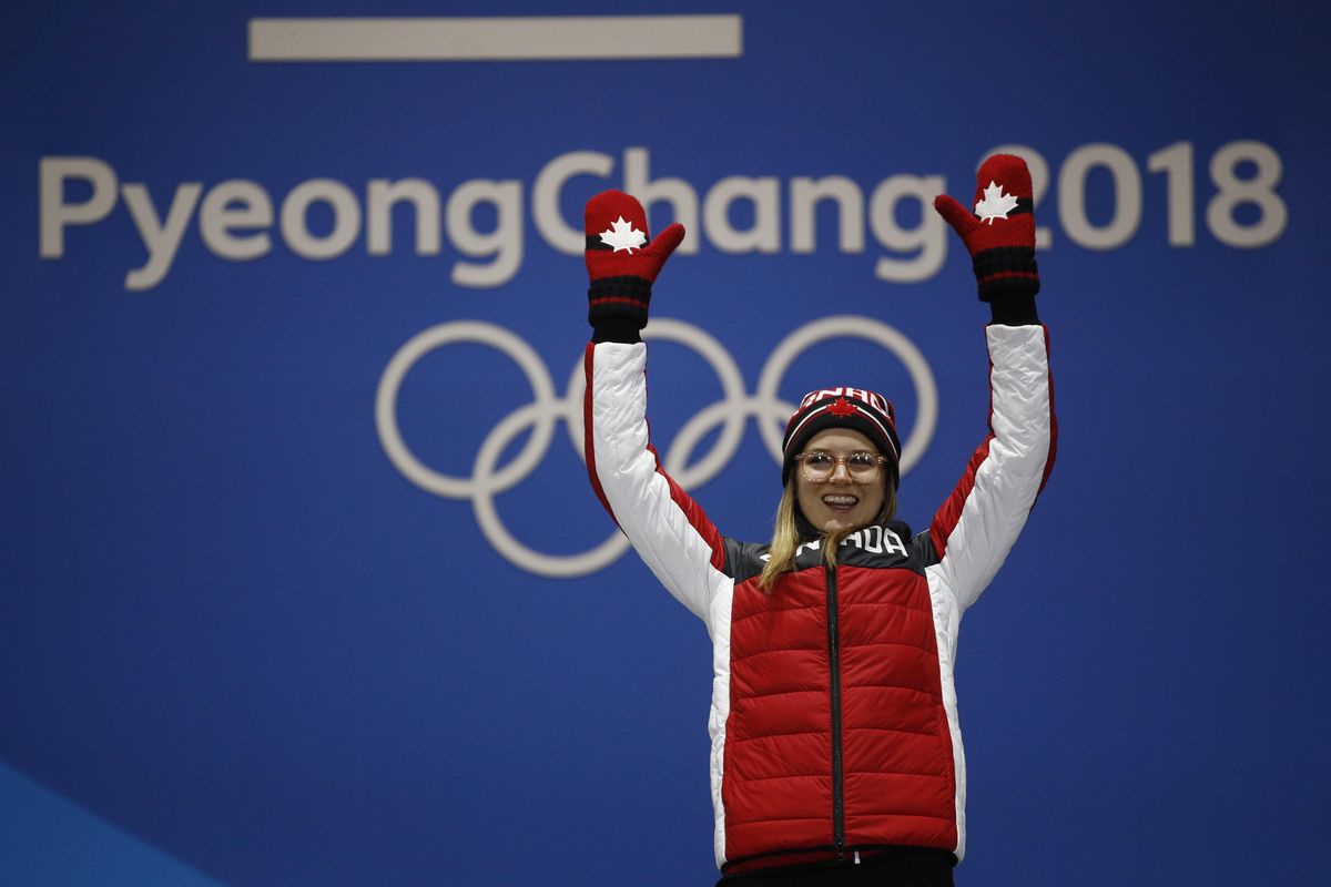 Cassie Sharpe of Canada, gold medalist in the women’s freestyle skiing halfpipe, smiles during the medals ceremony Tuesday at the 2018 Winter Olympics in Pyeongchang, South Korea. (Charlie Riedel / Associated Press)