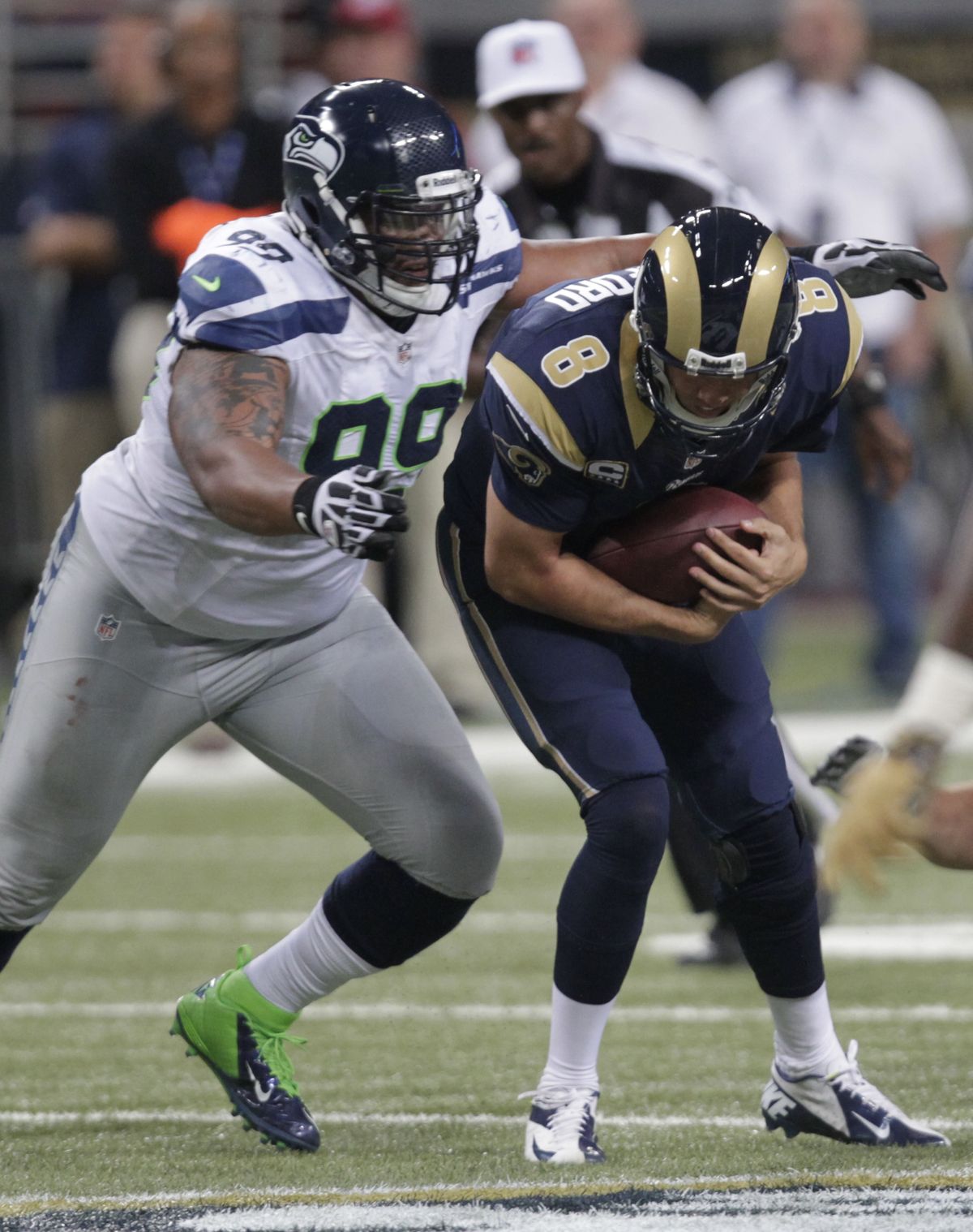 It appears Seahawks tackle Alan Branch, left, will be able to play despite ankle injury. (Associated Press)