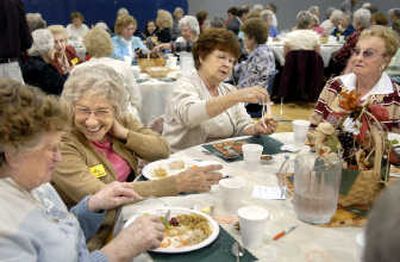 
From left, Leona Gates, Lois Sutton, Nina Hall  and Marian Paxson  chat during a Widow's Might luncheon at Spokane Valley Church of the Nazarene onSept. 30. The group meets four times a year for lunch and fellowship.
 (Photos by Holly Pickett / The Spokesman-Review)